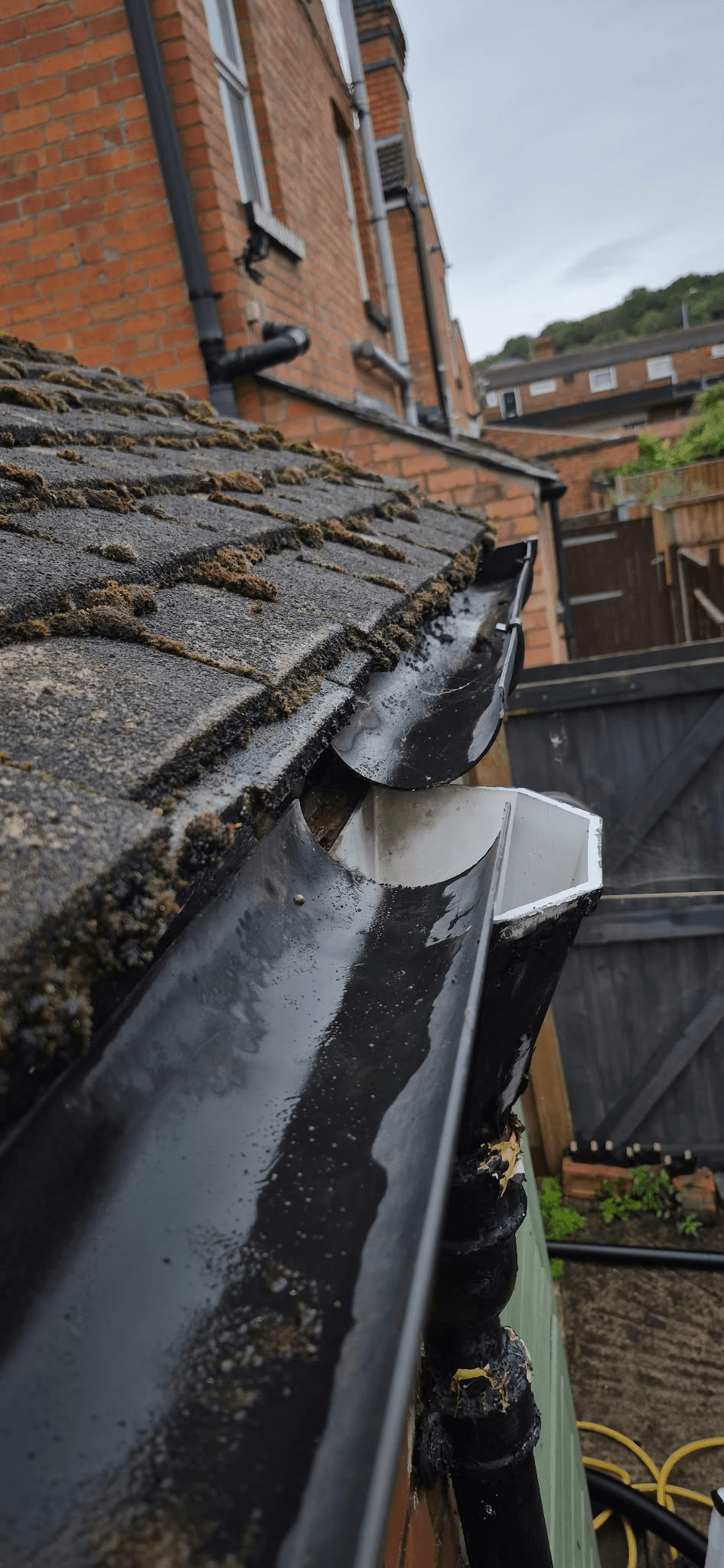 Clearing rubbish from gutters